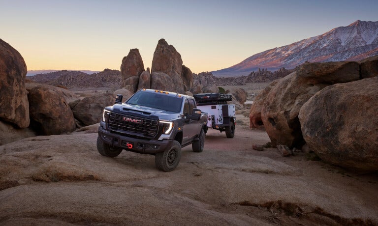 2025 GMC Sierra 2500 HD towing in the desert