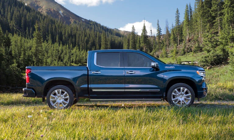 2026 Chevy Silverado 1500 side view in forest
