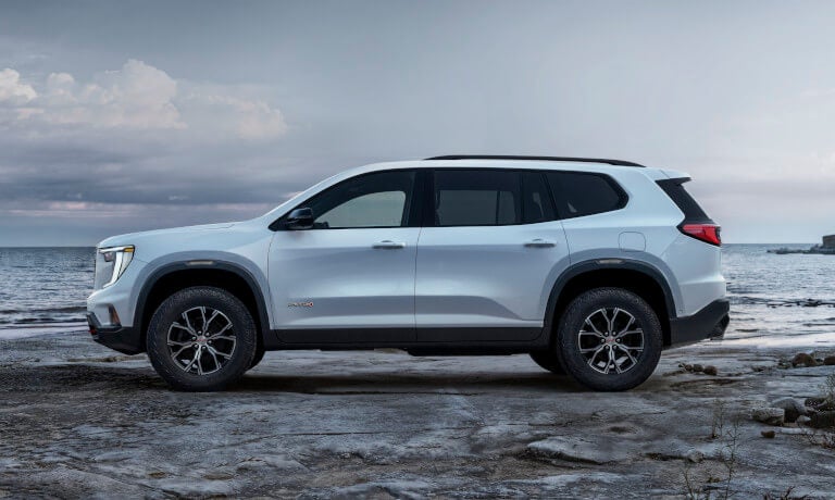 2026 GMC Acadia side view on beach