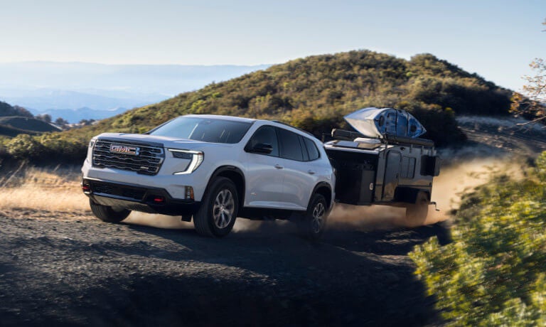 2026 GMC Acadia towing a trailer