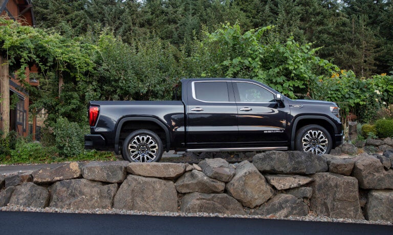 2026 GMC Sierra 1500 side view on driveway