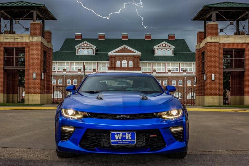 Camaro in front of lightning
