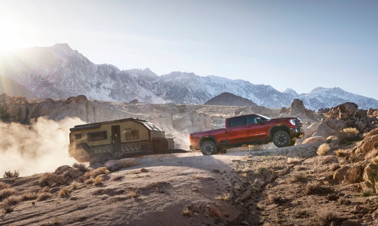 2025 GMC Sierra 2500 HD towing a camper