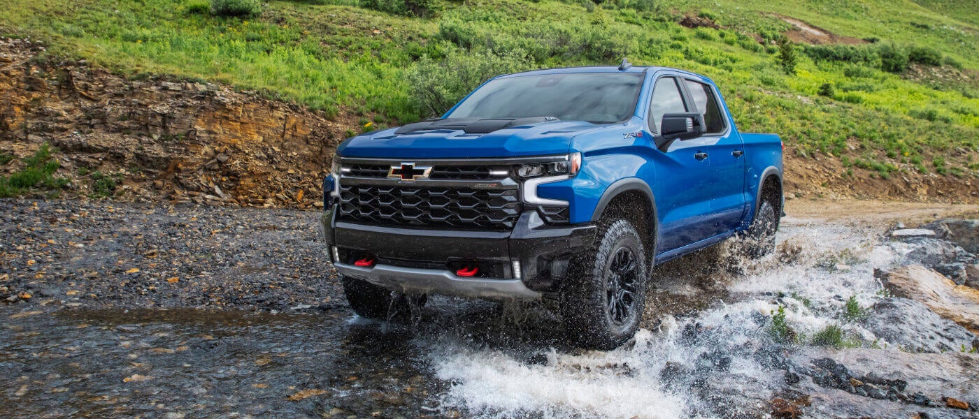 2026 Chevy Silverado 1500 driving in a stream