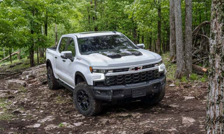 2026 Chevy Silverado 1500 parked in a forest