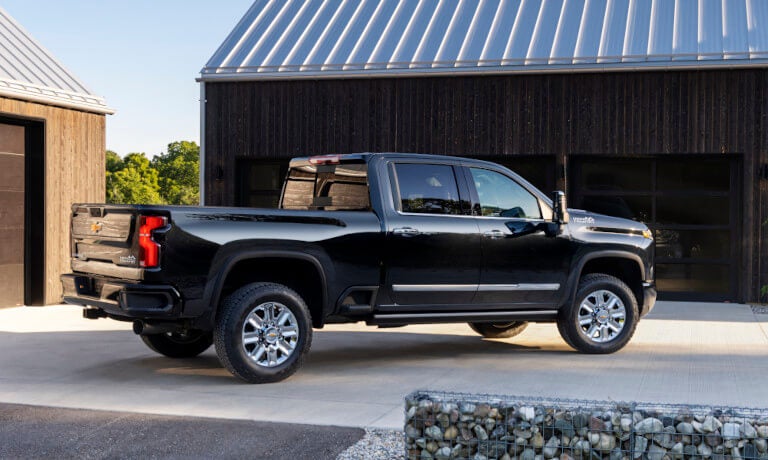 2026 Chevy Silverado 2500 HD parked by a barn