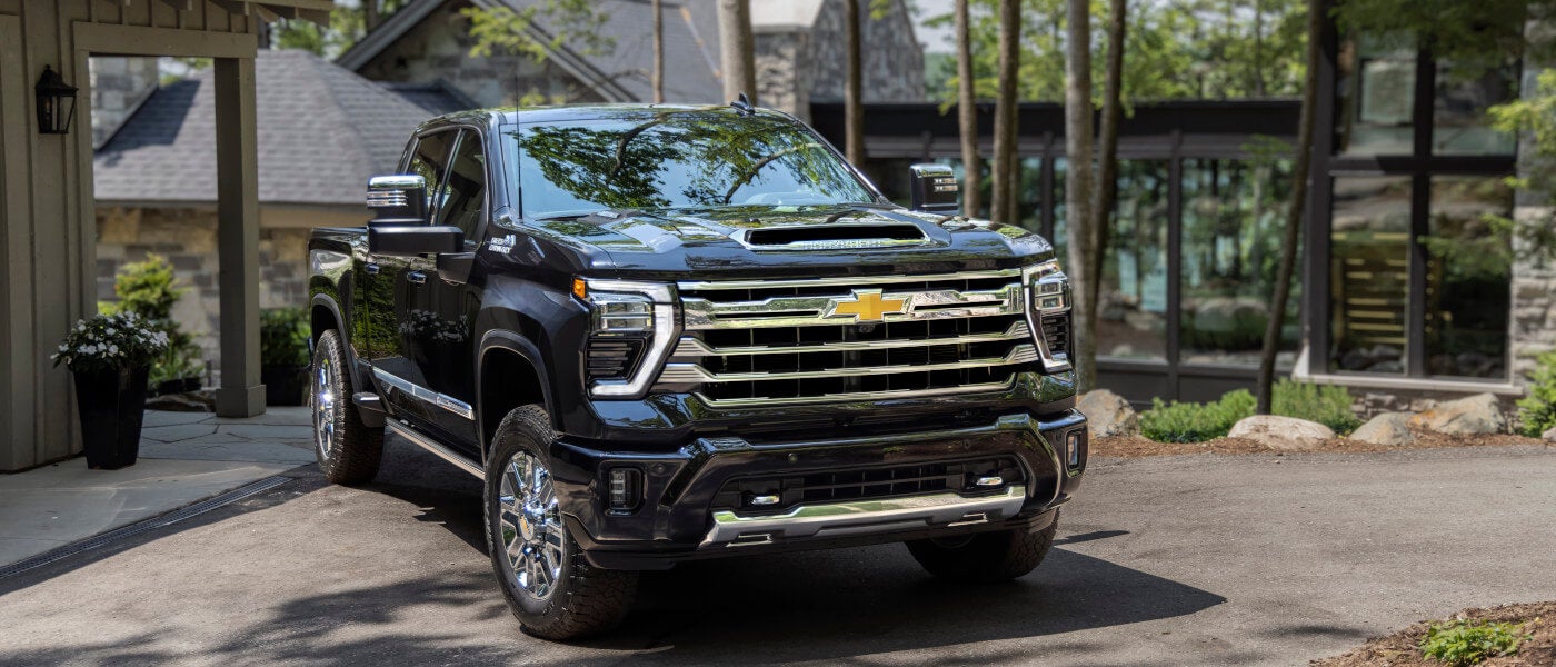 2026 Chevy Silverado 2500 HD parked outside a house
