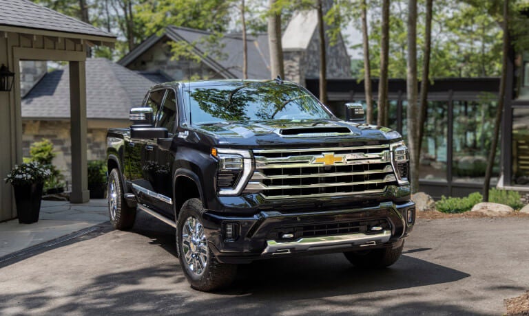 2026 Chevy Silverado 2500 HD parked outside a house