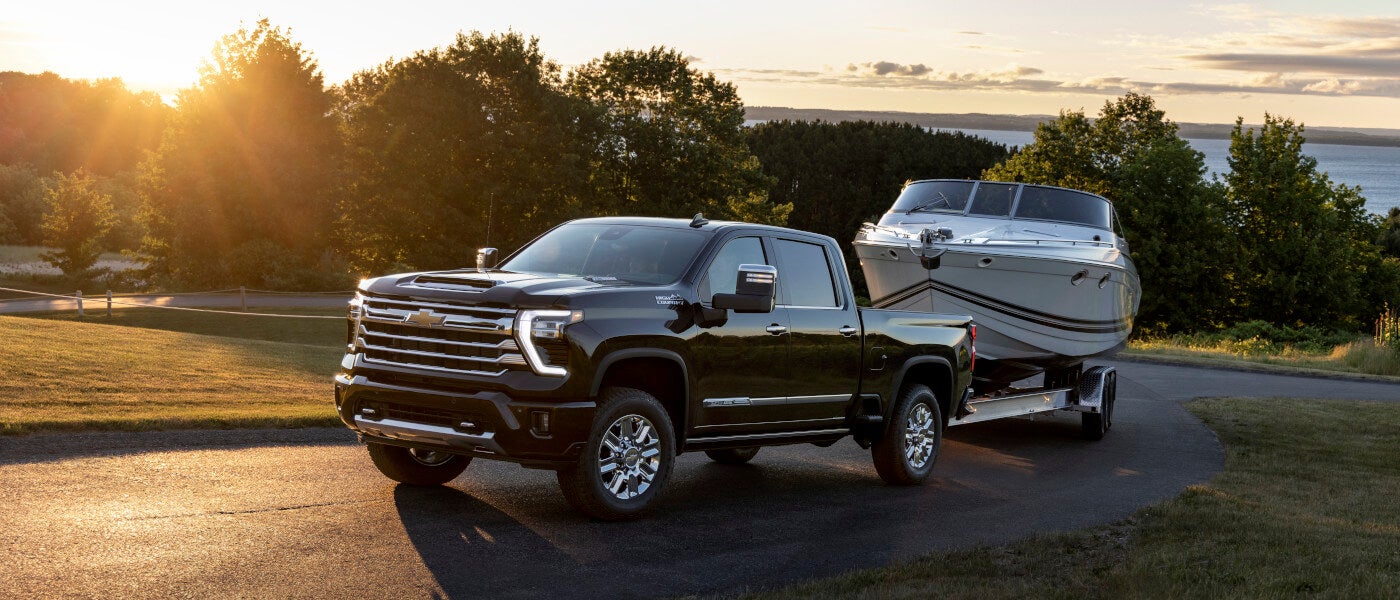 2026 Chevy Silverado 2500 HD towing a boat